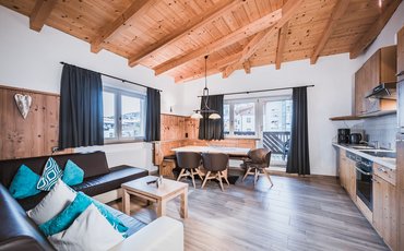 Wohnbereich im Apartment Typ a mit privater Sauna im Margarethenstein