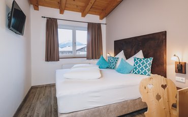 XXX Schlafzimmer im Apartment Typ C mit privater Sauna im Margarethenstein