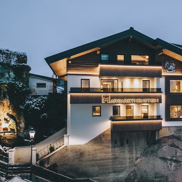 Margarethenstein Boutique Hotel & Apartment Margarethenstein Boutique Hotel & Apartment in Kaprun on the evening